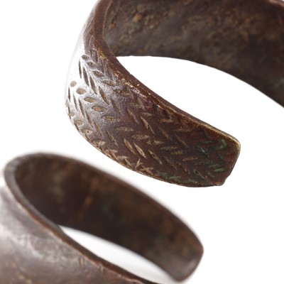 Lot 63 - An African bronze spiral armband