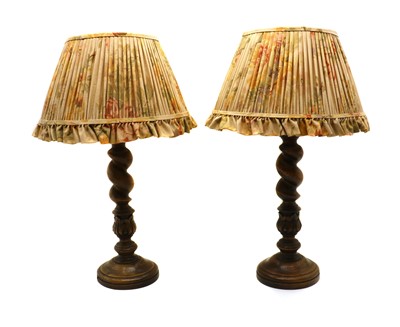 Lot 283 - A pair of barley twist table lamps