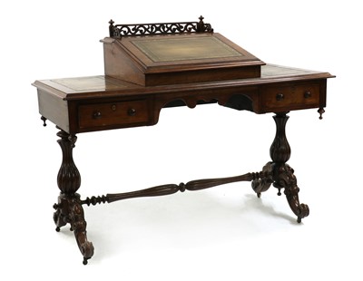 Lot 386 - A Victorian rosewood writing table
