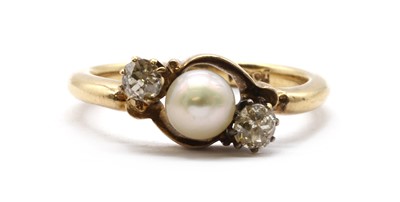 Lot 10 - A gold three stone cultured pearl and diamond ring