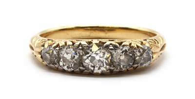 Lot 11 - An Edwardian gold five stone diamond ring