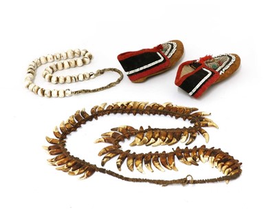 Lot 314 - A pair of leather and beadwork Iroquois moccasins