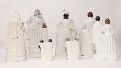 Lot 203 - A group of twenty Staffordshire porcelain figures