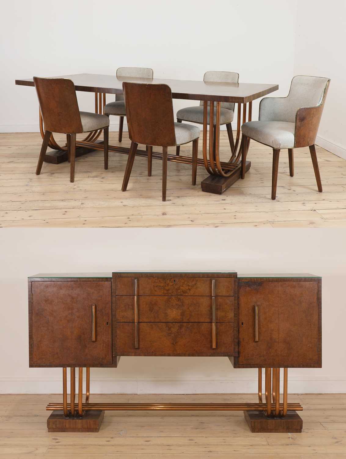 Lot 228 - An Art Deco burr walnut dining suite