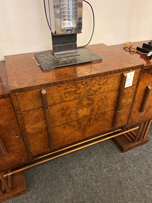 Lot 228 - An Art Deco burr walnut dining suite