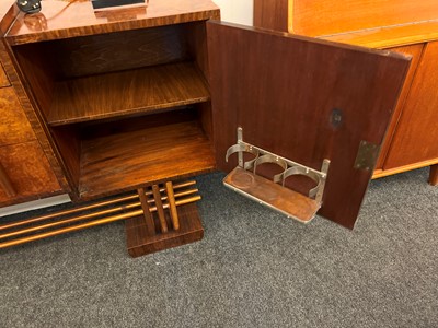 Lot 228 - An Art Deco burr walnut dining suite