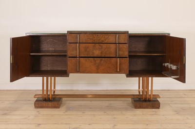 Lot 228 - An Art Deco burr walnut dining suite