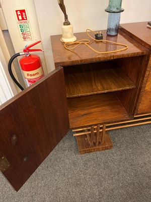 Lot 228 - An Art Deco burr walnut dining suite