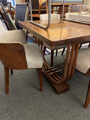 Lot 228 - An Art Deco burr walnut dining suite