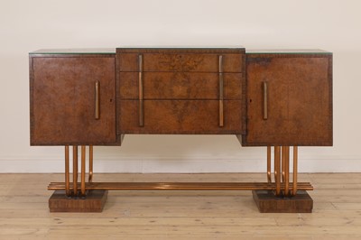 Lot 228 - An Art Deco burr walnut dining suite