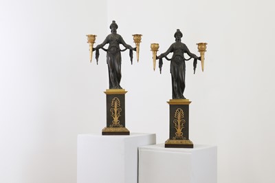Lot 98 - A pair of Empire gilt and patinated bronze candelabra