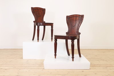 Lot 53 - A pair of George IV mahogany hall chairs