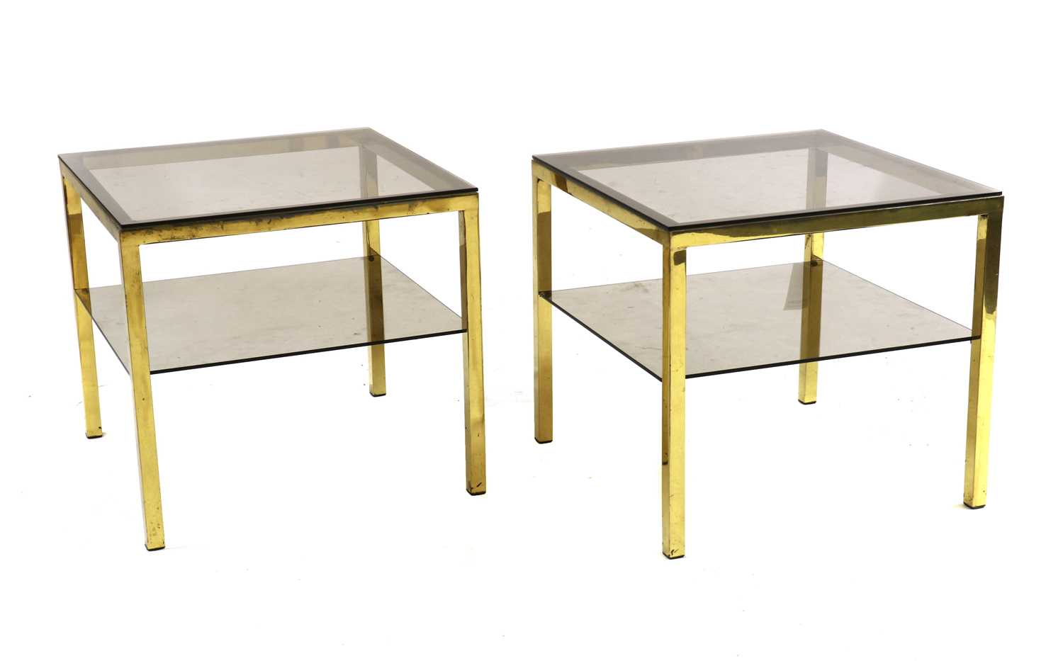 Lot 490 - A pair of brass side tables