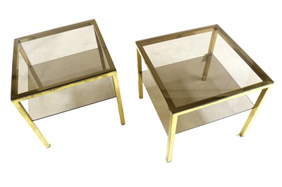 Lot 490 - A pair of brass side tables