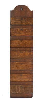 Lot 133 - An Arts and Crafts oak weekly organiser
