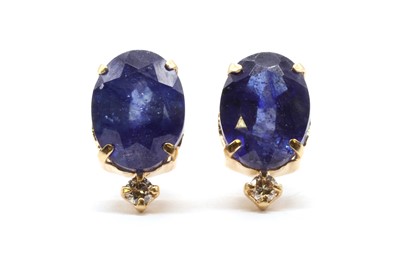 Lot 152 - A pair of gold fracture filled sapphire and diamond stud earrings