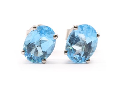 Lot 159 - A pair of silver single stone blue topaz stud earrings