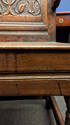 Lot 397 - An oak wainscot chair