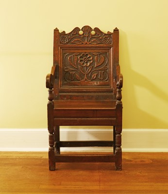Lot 397 - An oak wainscot chair