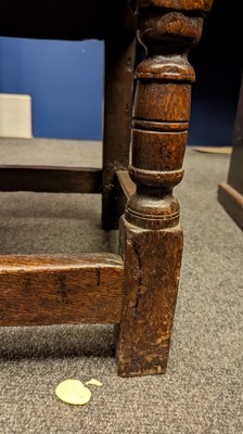 Lot 397 - An oak wainscot chair
