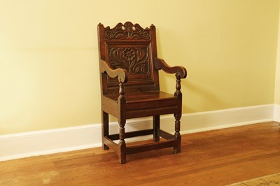 Lot 397 - An oak wainscot chair