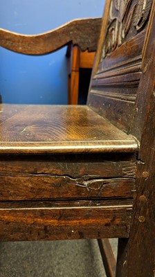 Lot 397 - An oak wainscot chair