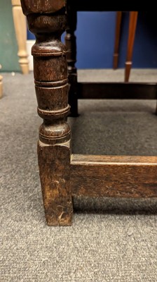 Lot 397 - An oak wainscot chair