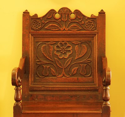 Lot 397 - An oak wainscot chair