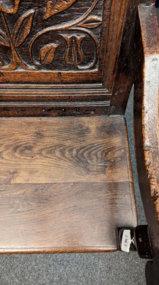 Lot 397 - An oak wainscot chair