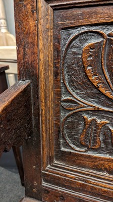 Lot 397 - An oak wainscot chair