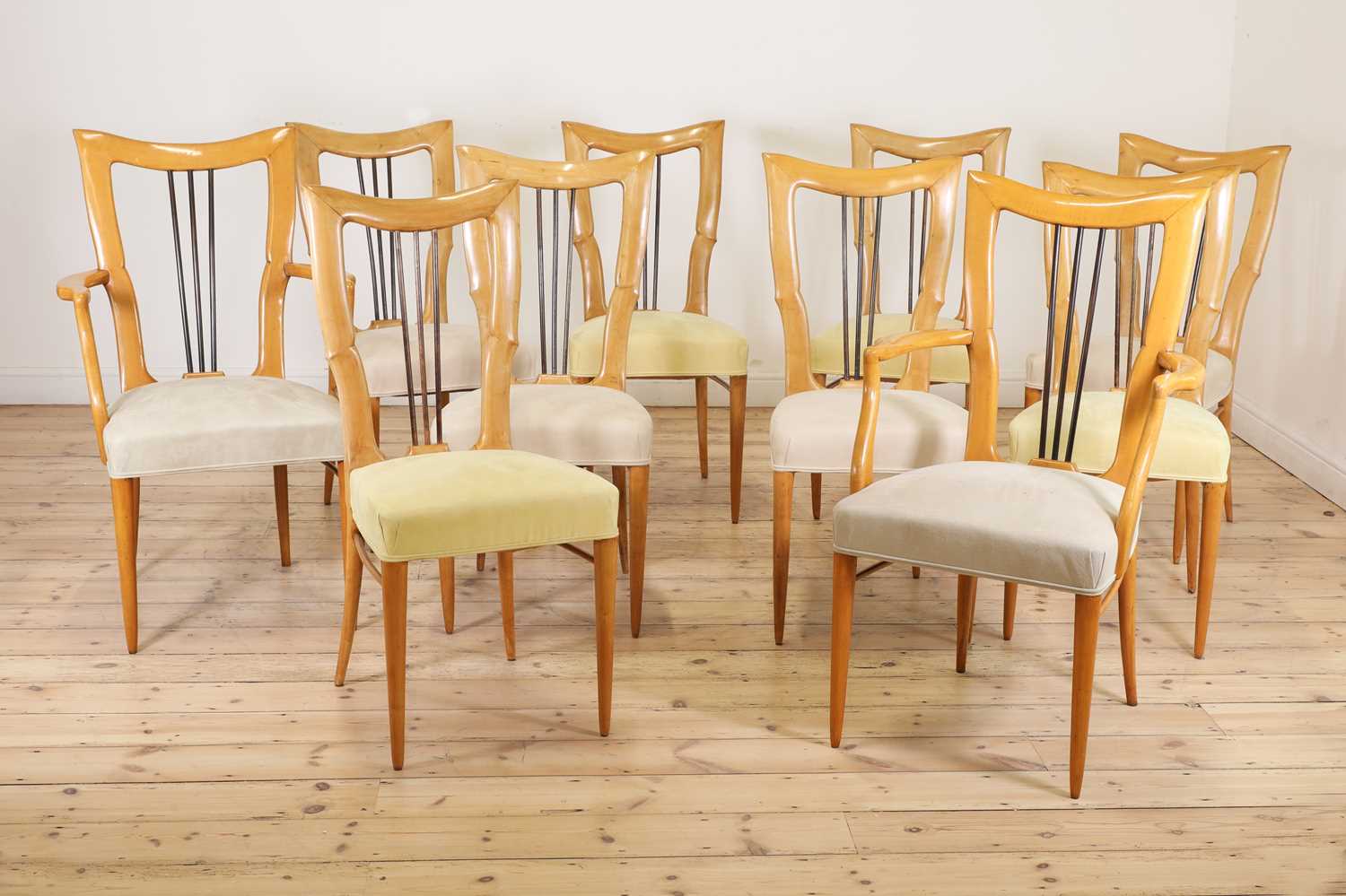 Lot 254 - A set of ten Italian sycamore harp-backed dining chairs