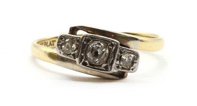 Lot 52 - A gold three stone diamond ring