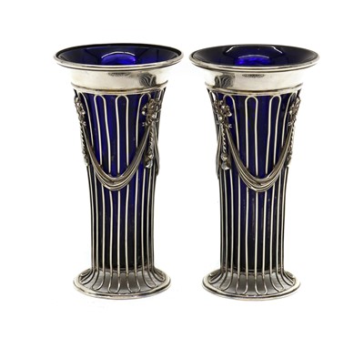 Lot 9 - A pair of George V silver vases