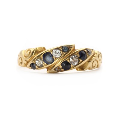Lot 10 - An Edwardian gold sapphire and diamond ring