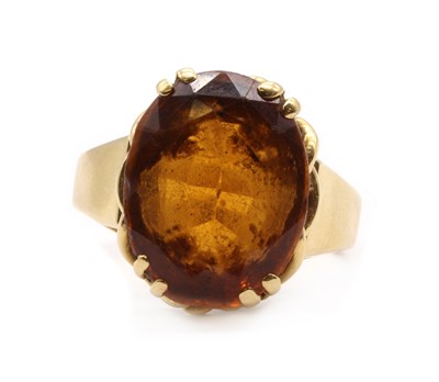 Lot 123 - An 18ct gold single stone citrine ring