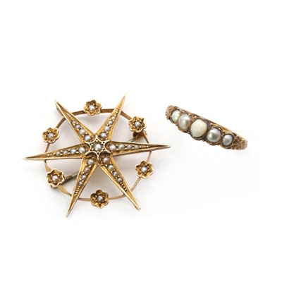 Lot 22 - A gold split pearl set star brooch