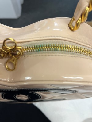 Lot 1452 - A Chanel pink leather heart bag