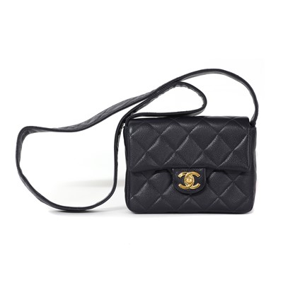 Lot 1460 - A Chanel navy caviar leather mini flap bag