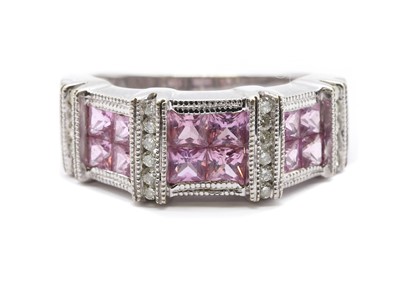 Lot 111 - A 14ct white gold pink sapphire and diamond ring