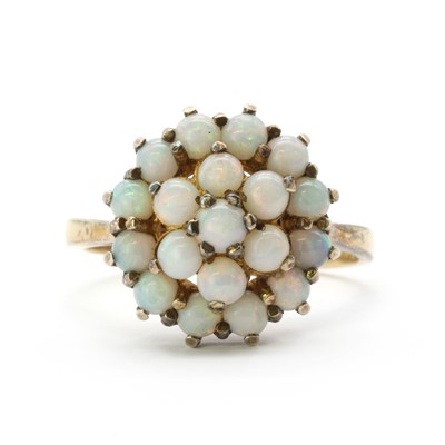 Lot 219 - A gold opal cluster ring