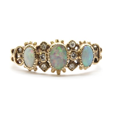 Lot 221 - A 9ct gold opal and diamond ring