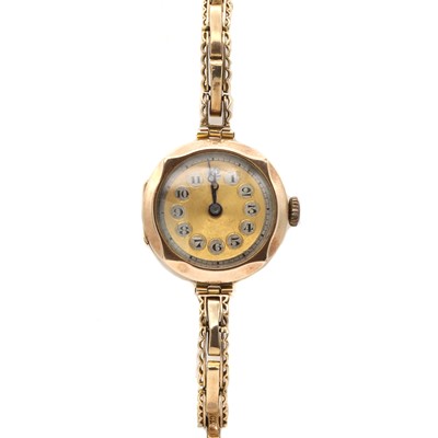 Lot 394 - A ladies' 9ct gold mechanical bracelet watch