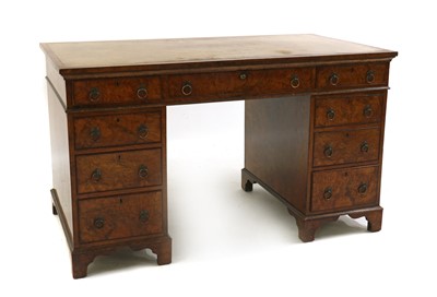 Lot 396 - A Victorian walnut pedestal desk