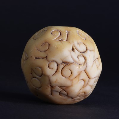 Lot 98 - A rare carved walrus ivory teetotum ball