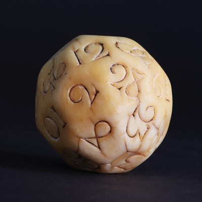 Lot 98 - A rare carved walrus ivory teetotum ball