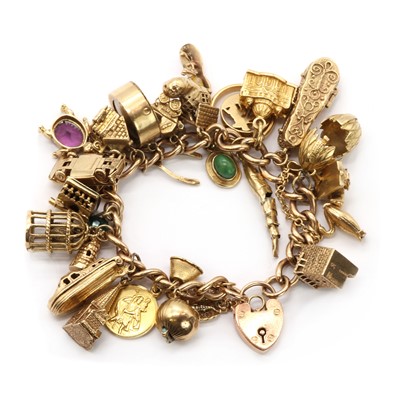 Lot 273 - A gold charm bracelet