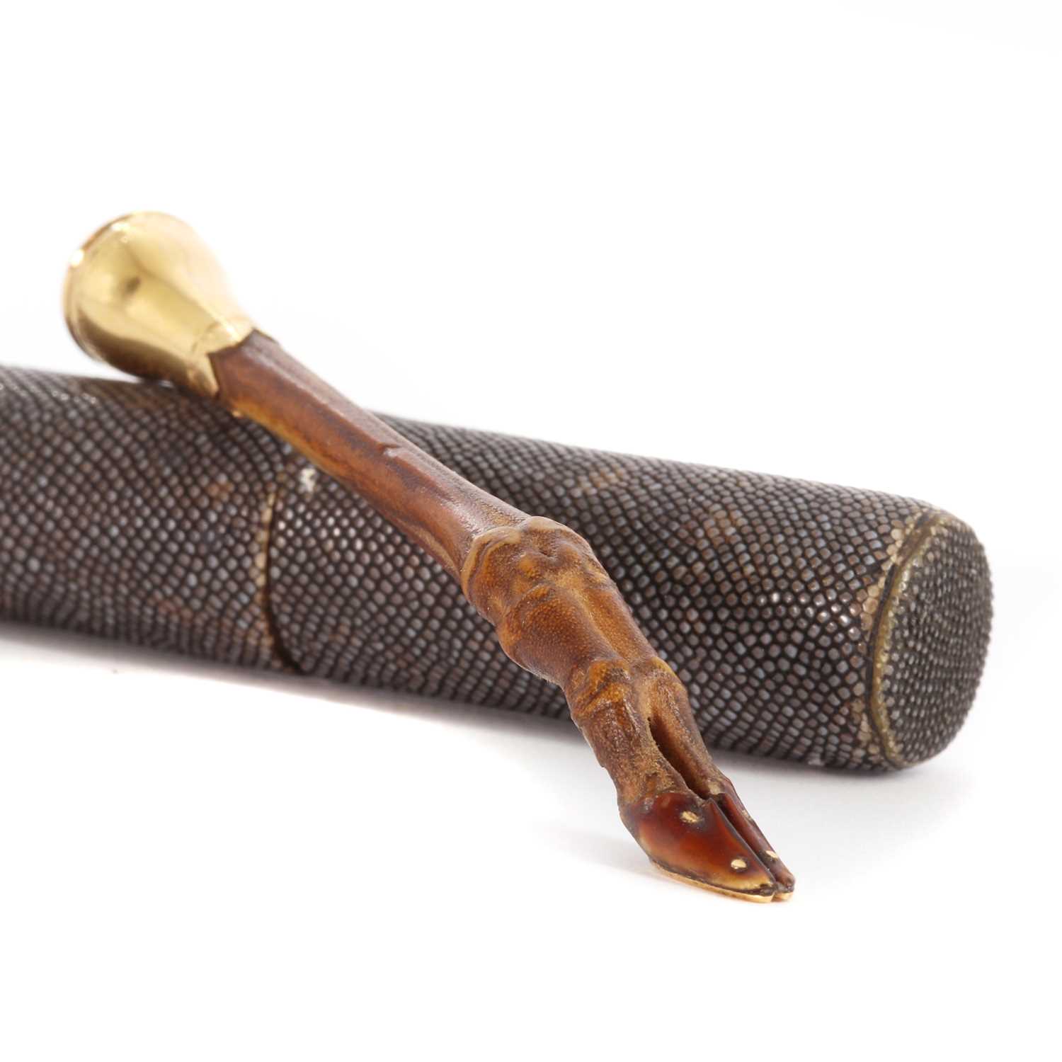 Lot 19 - A gold-mounted pipe tamper