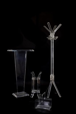 Lot 470 - A collection of four Lucite furniture accessories