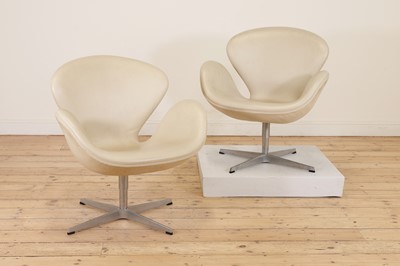 Lot 379 - A pair of vinyl 'Swan' chairs