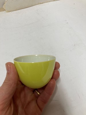 Lot 97 - A Chinese yellow glazed tea bowl